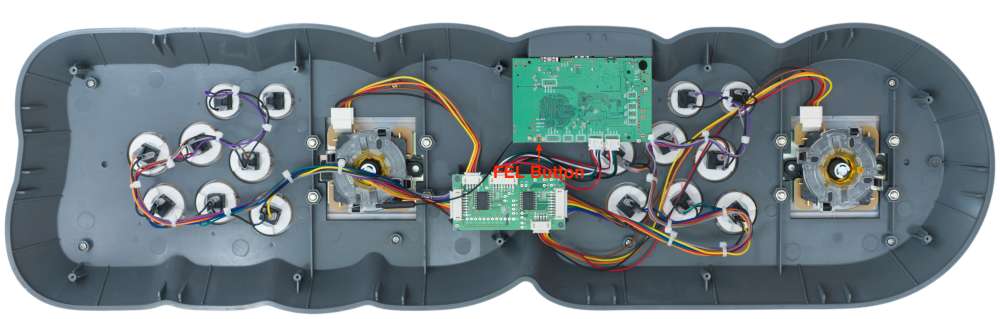 It's to the left of the controller serial ports, on the other side of the board.