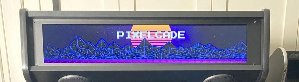 Photo of the Pixelcade showing the mostly purple Pixelcade banner.