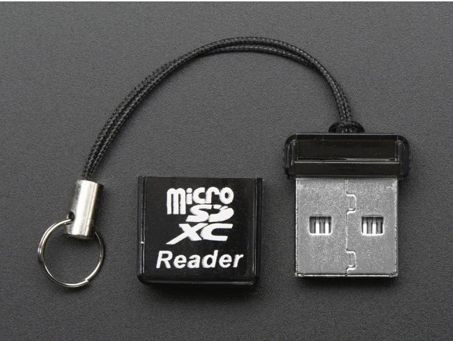 A micro-SD card reader the size of the USB tongue itself.